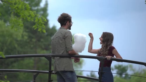 Couple eating cotton candy