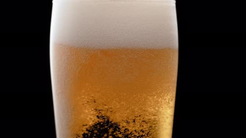 Refreshing Lager Poured into Glass with Bubbles