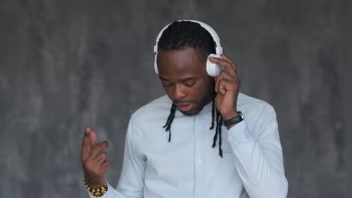 Young Adult Listening to Music with Headphones