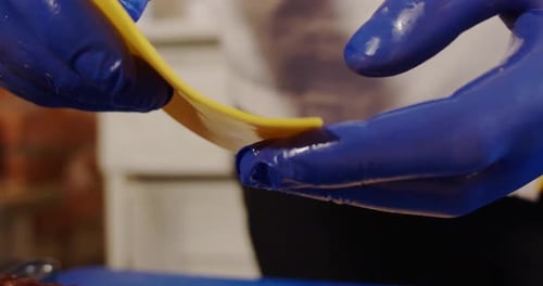 Close UP. Making Cheese Burger. Chef Takes Cheese Preparing Burger.