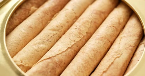 Delicious Crispy Rolled Wafers in a Gold Container