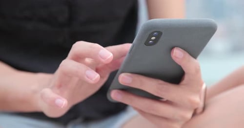 Close up woman use of smart phone at outdoor