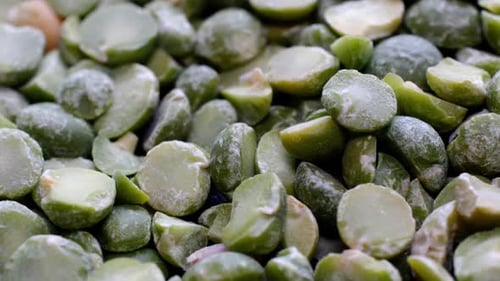 Pile Dried Split Green Peas Rotate Slowly on Turntable Clockwise