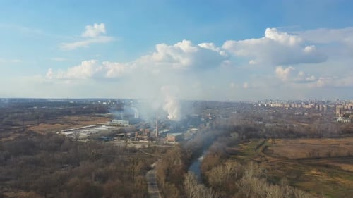 Aerial Shot of Industrial Plant Which Emitting Carbon Dioxide to Nature
