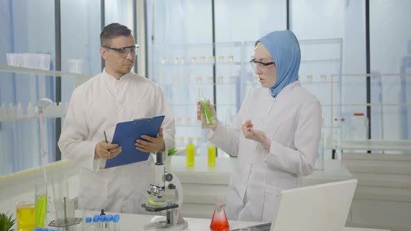 Scientists Studying Sample in Modern Laboratory, Science Stock Footage ...