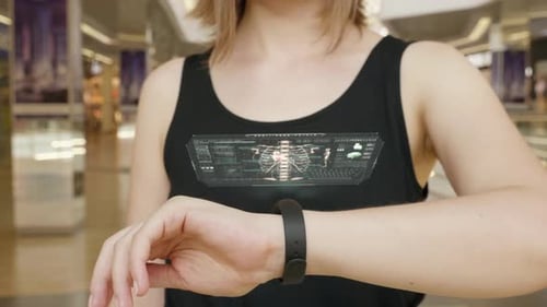 Woman Uses Fitness Tracker with Health Display