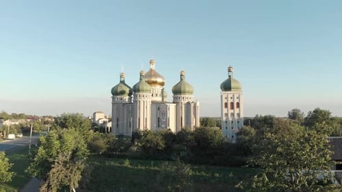 White Orthodox Church on Blue Sky Background