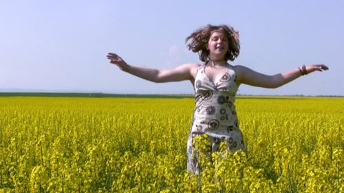 Girl And Canola Field