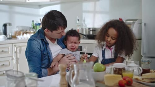Family Baking Together in Bright Kitchen