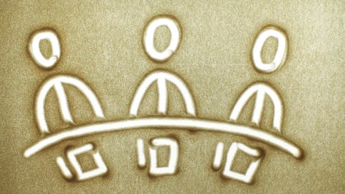 Teamwork im Büro Zeichnen im Sand