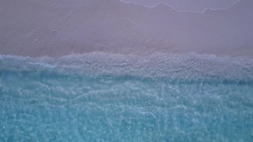 Daytime panorama of shore beach voyage by lagoon with sand background near palms
