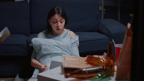 Depressed Woman Reading Eviction Notice Screaming Crying Suffering a Shock