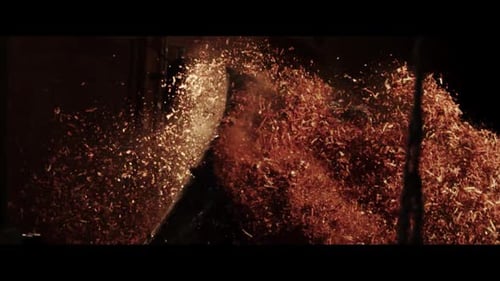 Man in Gas Mask Covered in Wood Chips