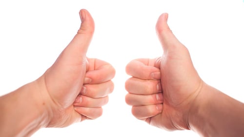 Hands Giving Thumbs Up Approval on White Background