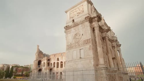 Triumphal Arch Built Against Colosseum in Center of Rome