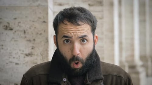 Confident attractive young man looking