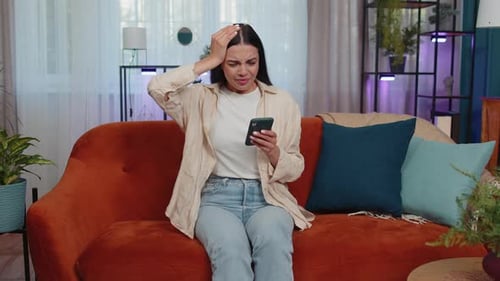 Woman Receives Bad News On Her Mobile Phone