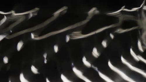 Abstract Light Patterns on Black Background