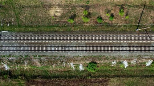 Aerial View of Railroad Tracks in a Rural Setting