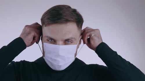 Close Up Man Wearing Protective Medical Mask