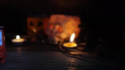 Candles Illuminate Halloween Cafe Decoration at Night