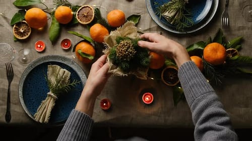 Festive Table Setting with Tangerines and Candles