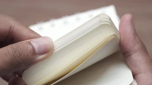 Flipping Paper Book Pages Close Up