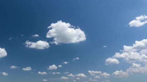 Clouds Drifting in a Deep Blue Sky