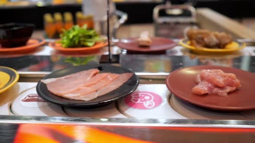 Moving Conveyor Plates at the Buffet