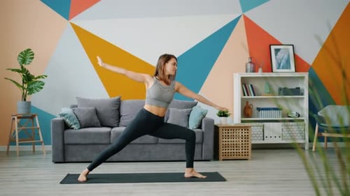 Woman Doing Yoga at Home