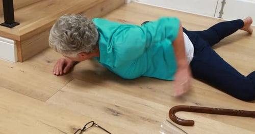 Senior woman fallen down from stairs