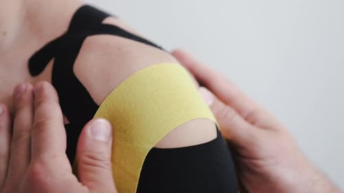 Shoulder with Kinesiology Tape for Therapy