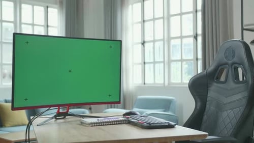 Green Screen Desktop Computer On A Table With A Chair In The Working Room At Home