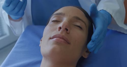 Woman Receives Cosmetic Injection in Hospital