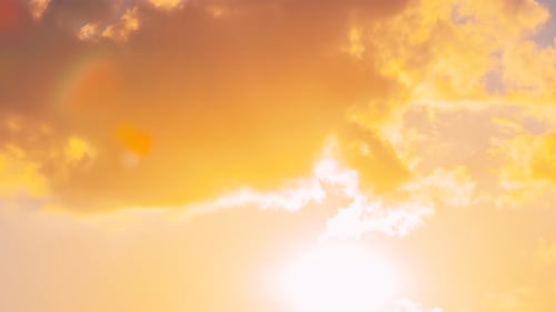 Sunset Cloudy Sky With Fluffy Clouds