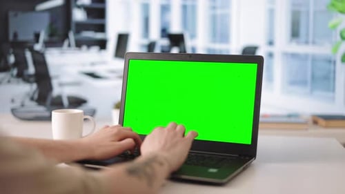 Programmer Using Chroma Key Laptop