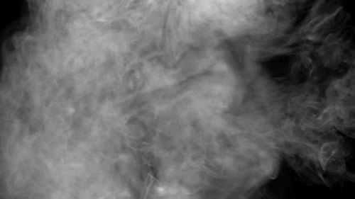 Swirling White Smoke on Black Background