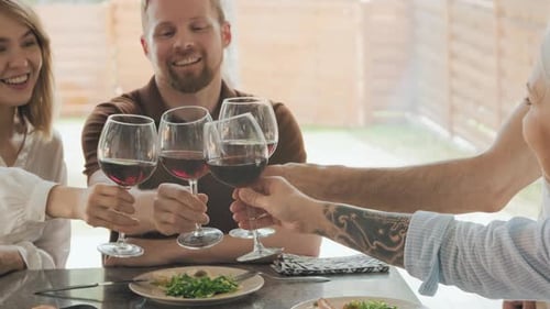 Friends and Family Toasting with Wine