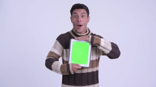 Man Holding Tablet With Green Screen Mockup