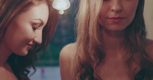 Two Beautiful Women Smiling Indoors, Close Up