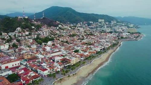 Coastal City and Mountains Aerial View
