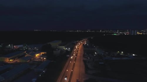 Aerial view of the on the outskirts of the city at night with industrial zone. 16