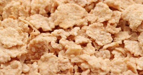Crisp Golden Corn Flakes Piled Up Close-Up