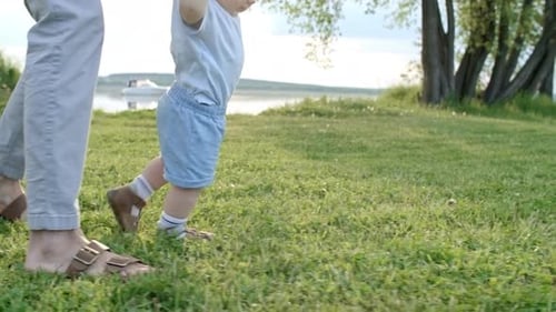 Excited Toddler Boy Learning to Walk