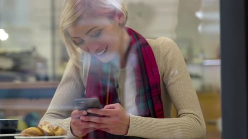 People and technology. Beautiful woman using phone in cafe