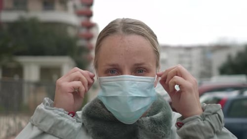 Woman Removing Surgical Mask, Smiling Portrait Close Up