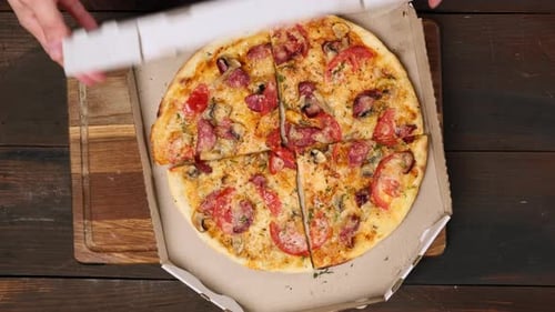 Delicious Pizza Reveal in a Cardboard Box