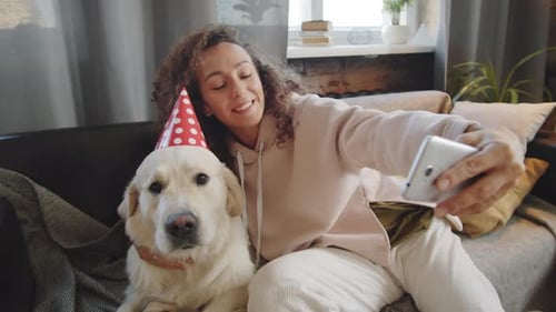 Woman Celebrates Birthday with Dog Pet Selfie