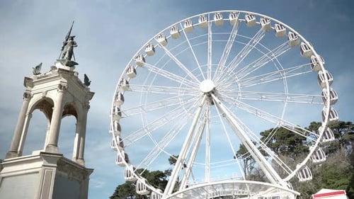Amusement park attractions in a summer day