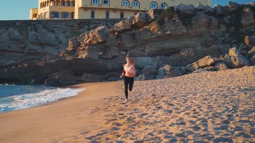 Sporty Blonde Woman Running Ocean Beach